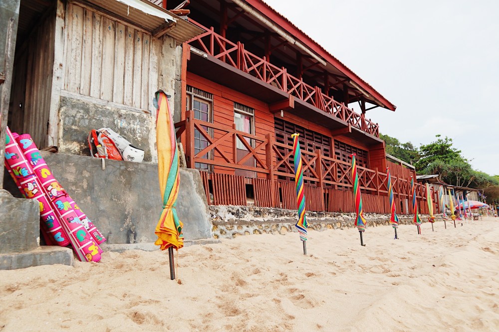 UMBRELLA BEACH. There are lots of umbrella beaches in Indrayati that you can use. They umbrellas in this picture are already closed, though, because it's about to go sundown.