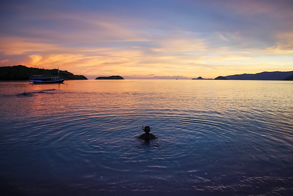 SNORKELING AROUND THE ISLAND.