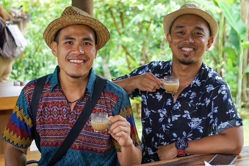 ENJOYING KOPI LUWAK.