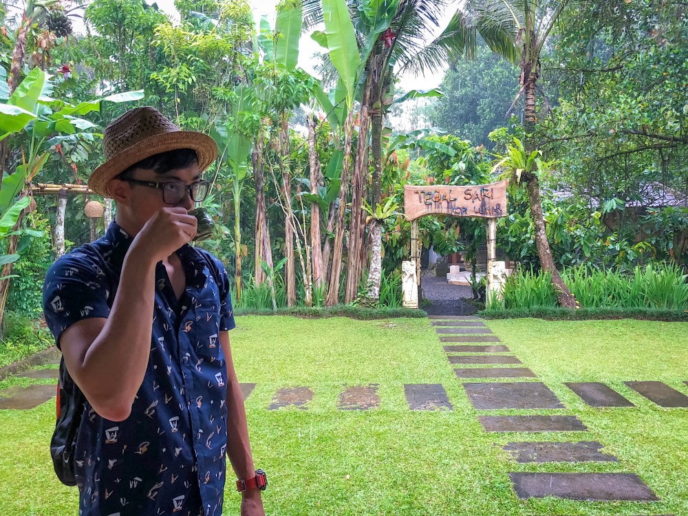 ENJOYING KOPI LUWAK.