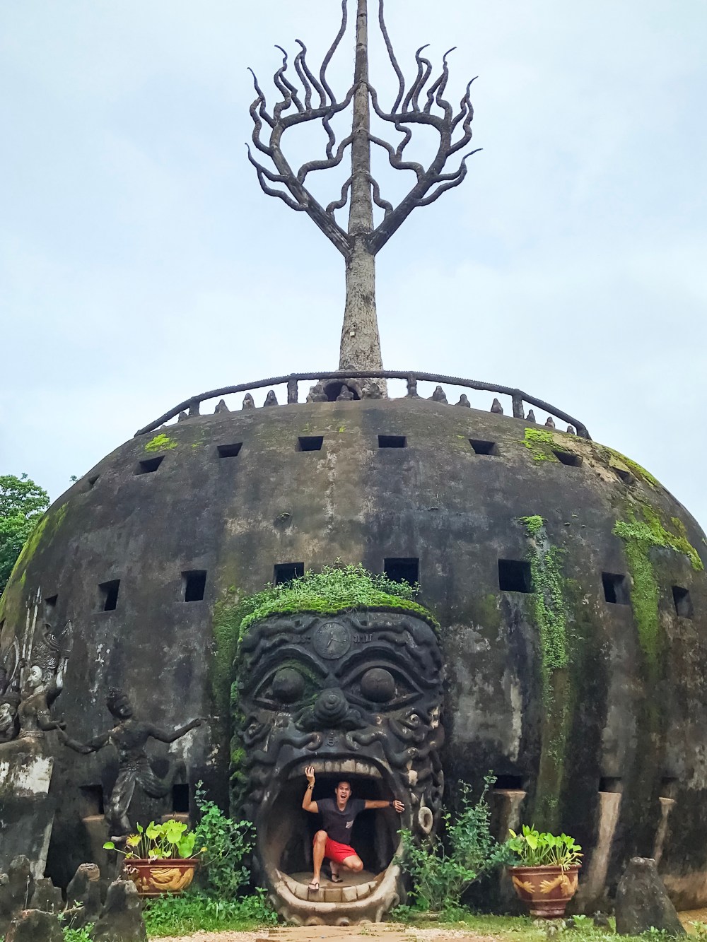 GOOFING AT THIS PUMPKIN-LIKE STRUCTURE.