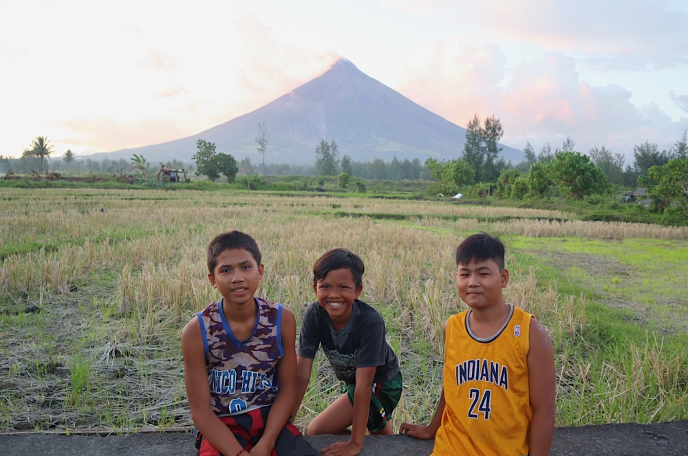 BOYS OF LEGAZPI. Here are Steven (middle), Roger (left) and Julius (right) whom I have met while exploring the Cagsawa Ruins.