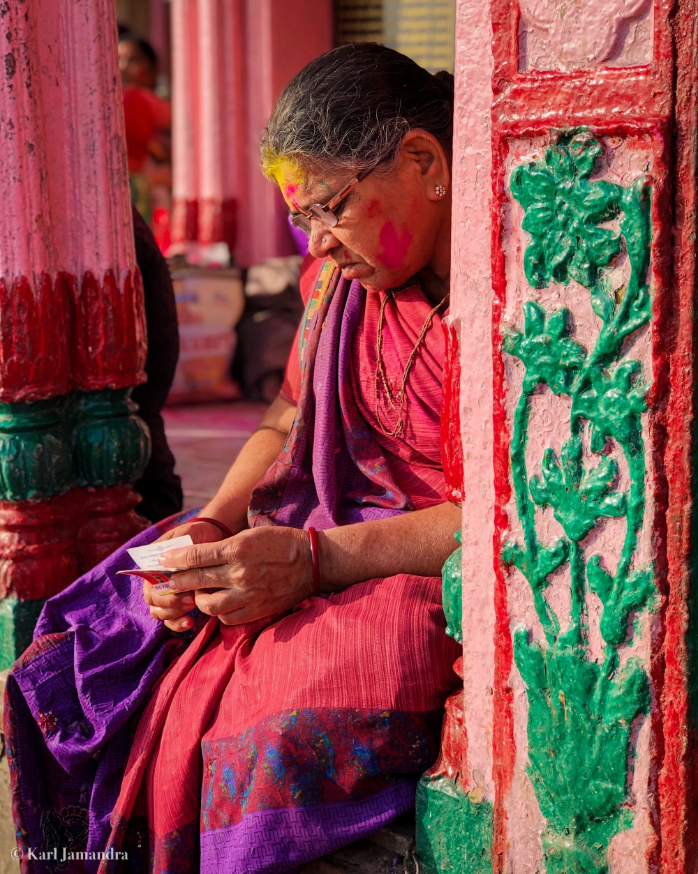 A HINDU WOMAN PRAYING.